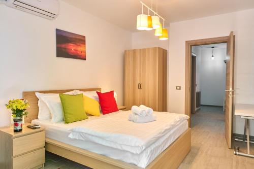 Postel nebo postele na pokoji v ubytování Sun & Fun Apartment in SPA Pools Resort
