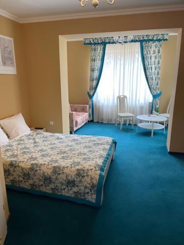 Кровать или кровати в номере Provans