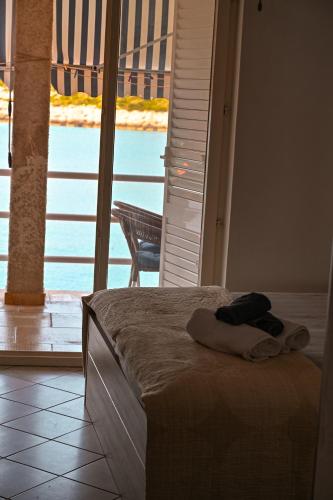 Ένα ή περισσότερα κρεβάτια σε δωμάτιο στο Albert Apartments