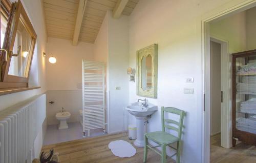 a bathroom with a sink and a toilet at Capriva Del Friuli - CASA RONCUS in Capriva del Friuli
