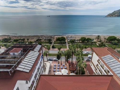 a view of the ocean from a building at Eftalia Down Town in Alanya