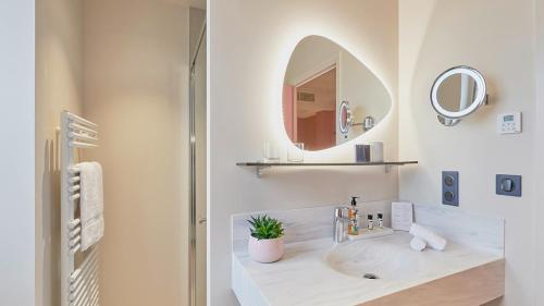 Ванна кімната в Maison Tiegezh