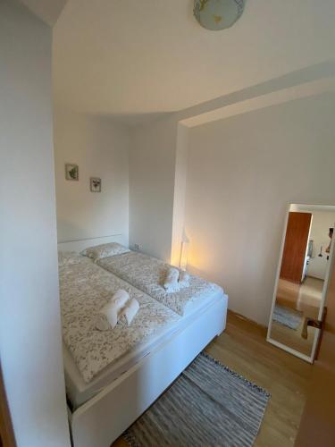 Postel nebo postele na pokoji v ubytování Varga apartment