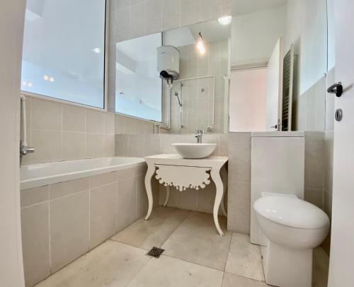 A bathroom at Olimp apartment with terrace