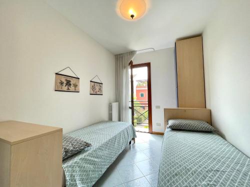 Residence Ca D'Oro con piscina Cavallino - Carraro Immobilare - Family Apartments