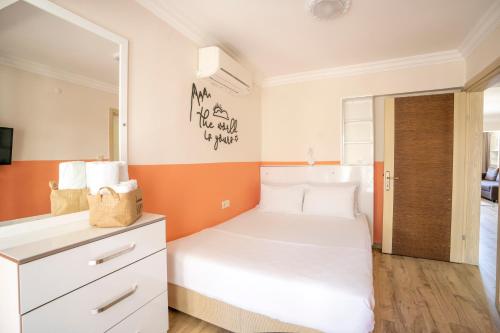 Katil atau katil-katil dalam bilik di XOX Apart Hotel