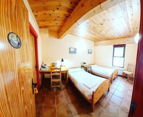 En eller flere senger på et rom på Albergue El Pajar de Agés - Exclusivo para peregrinos - Exclusive for pilgrims