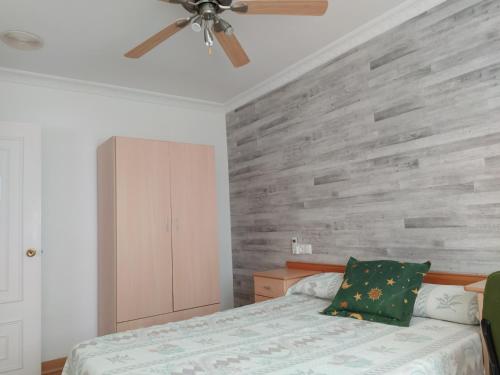 Ein Bett oder Betten in einem Zimmer der Unterkunft Confortable excelentes vistas