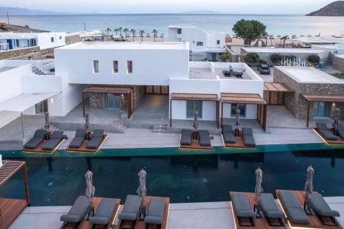 an aerial view of a villa with a swimming pool at Elia Mykonos Resort in Elia Beach