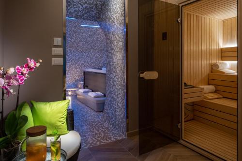 a bathroom with a shower with a toilet in it at Casa Blandano B&B in Castelmola