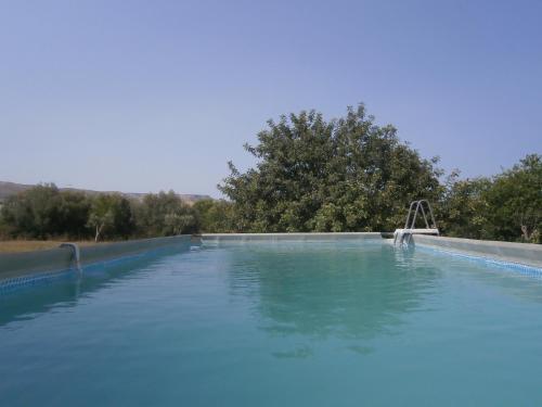 Bazén v ubytovaní Dimore del Carrubo - villa con piscina alebo v jeho blízkosti