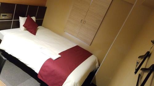 Letto o letti in una camera di MyHotel Okazaki
