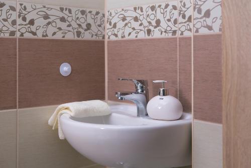 Kúpeľňa v ubytovaní Forrás Apartman