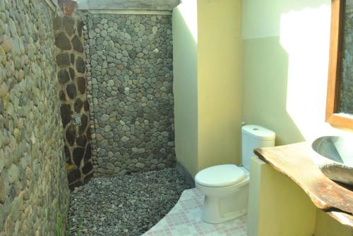 Ένα μπάνιο στο Pondok Rahayu Guest House
