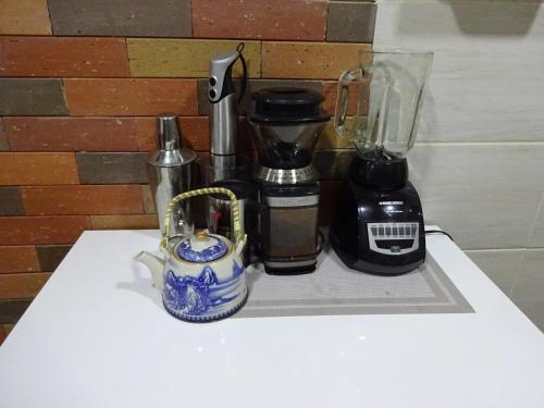 Tetera y cafetera en Villa Ester Hostel Vereda Cay