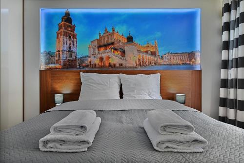 Posteľ alebo postele v izbe v ubytovaní Apartamenty Prestige Browar Lubicz Stare Miasto