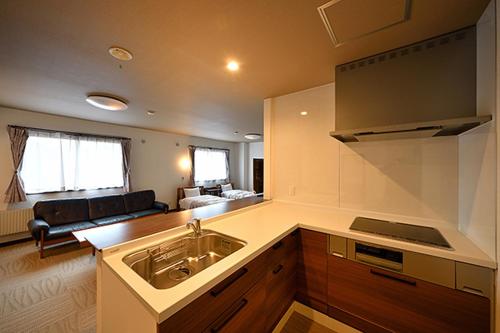 Una cocina o zona de cocina en Hotel Takimoto