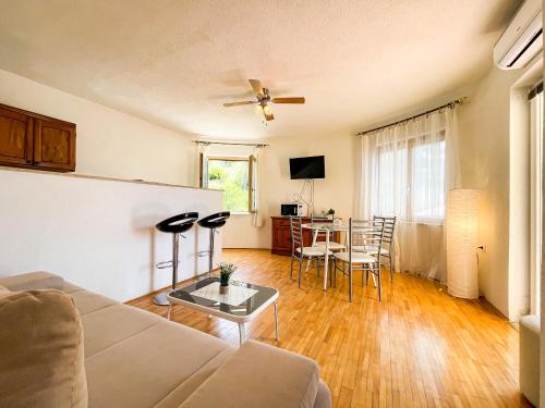 a living room with a couch and a table at Vacation Rentals Croatia in Split