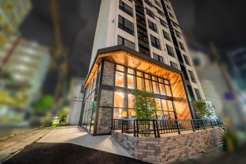 a rendering of a building with a building at Hotel Brick in Naha