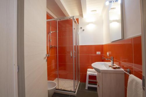 a bathroom with a shower and a sink at Al Baglio in Castellammare del Golfo