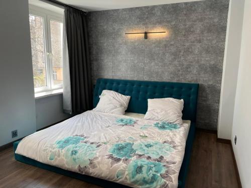 Posteľ alebo postele v izbe v ubytovaní Lux Apartament Sienkiewicza