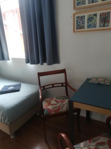 Кровать или кровати в номере Simplon Hostel