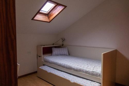 Ліжко або ліжка в номері RIOyMAR Apartamento