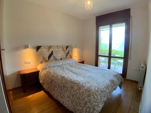 Letto o letti in una camera di C14 - Apartamento Mirador de Cerler - Villmor