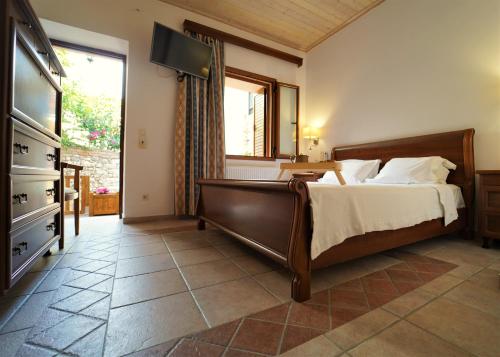 Llit o llits en una habitació de Hotel Tourist