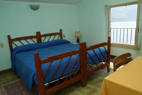 Giường trong phòng chung tại La Foresta Monteisola
