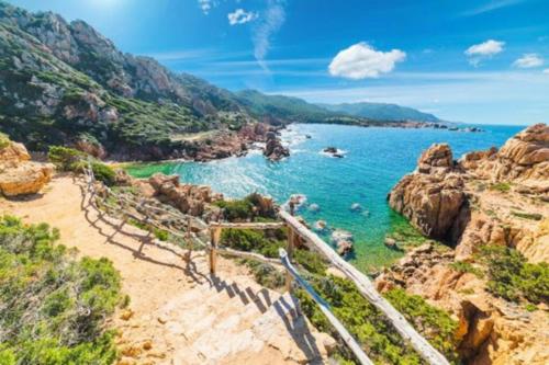 a view of the ocean from a cliff at Apartment - La dolce vita - where dreams come true in Valledoria