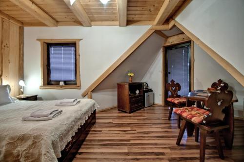 Magnat Inn Sauna & Relaxにあるベッド