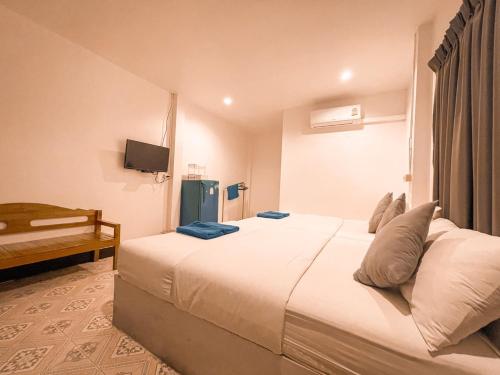 Un pat sau paturi într-o cameră la KohLan Hansa
