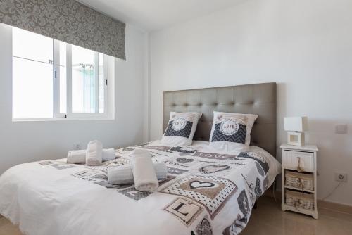 A bed or beds in a room at Room in Apartment - 1st line top floor apartment
