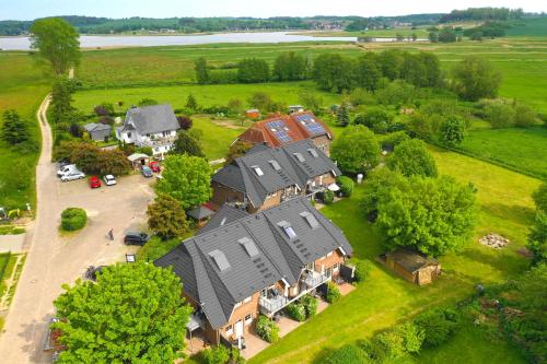 an overhead view of a large house in a field at Appartementanlage Lancken-Granitz in Lancken-Granitz
