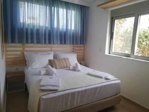 Katil atau katil-katil dalam bilik di EVMAR luxury dream beach apartment