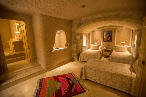 Kistar Cave Hotelにあるベッド