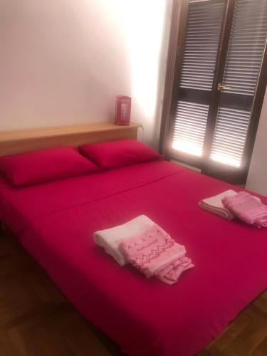 Postel nebo postele na pokoji v ubytování B&B Casa Nicole