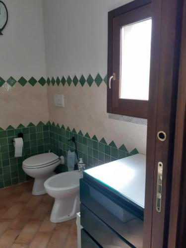 Ванна кімната в SEA VIEW HOUSE SARDEGNA