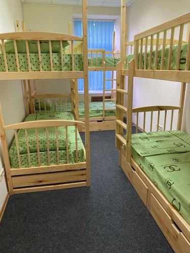 Cama o camas de una habitación en Хостел Мажор