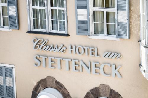 a sign on the side of a building at Classic Hotel Am Stetteneck in Ortisei