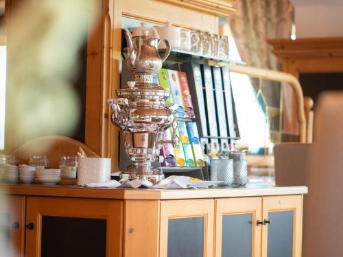a trophy sitting on top of a table at Hotel Weingut Innerleiterhof in Schenna