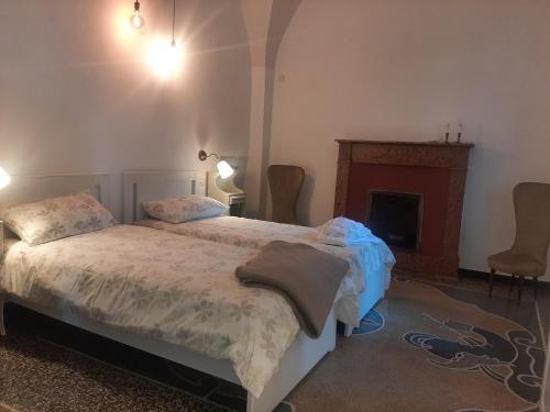 Un pat sau paturi într-o cameră la Casa Gazzano