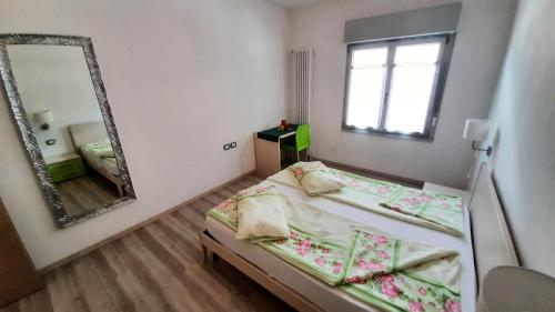 Ένα ή περισσότερα κρεβάτια σε δωμάτιο στο Casa Gemma