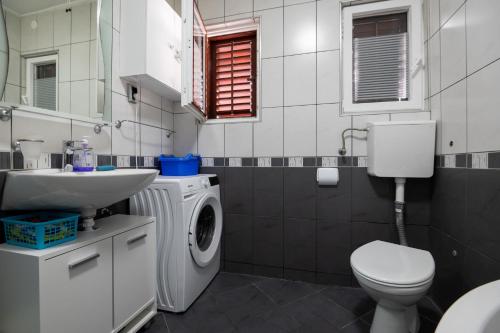 Koupelna v ubytování Apartments Onorina