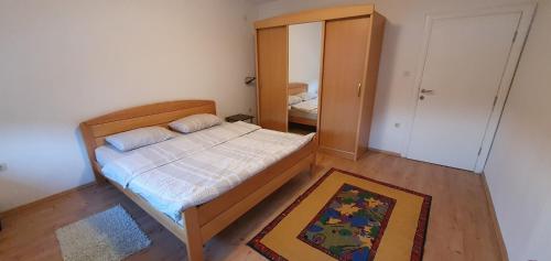 Postel nebo postele na pokoji v ubytování Apartman Jurak