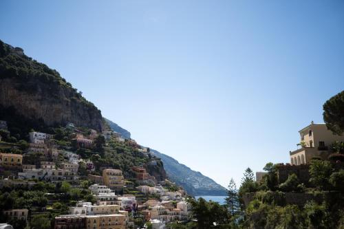 a view of a town on a mountain at Positamy in Positano