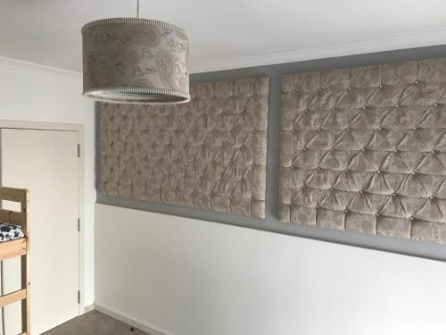 a kitchen with white walls and a ceiling at Casa da Aldeia in Tomar