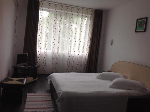 Ένα ή περισσότερα κρεβάτια σε δωμάτιο στο Guest House Salcia