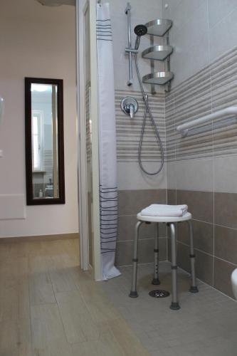 Ein Badezimmer in der Unterkunft L'Angoletto#1